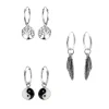 Set van zilveren oorbellen, oorringen met hanger van tree of life, veer en yin en yang