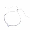 Verstelbare armband met bolletjes en kristal