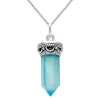Zilveren ketting met hanger, puntige blauwe chalcedoon steen met rijk bewerkte rand