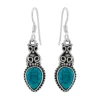 Zilveren oorhangers, turquoise steen en sierlijke details