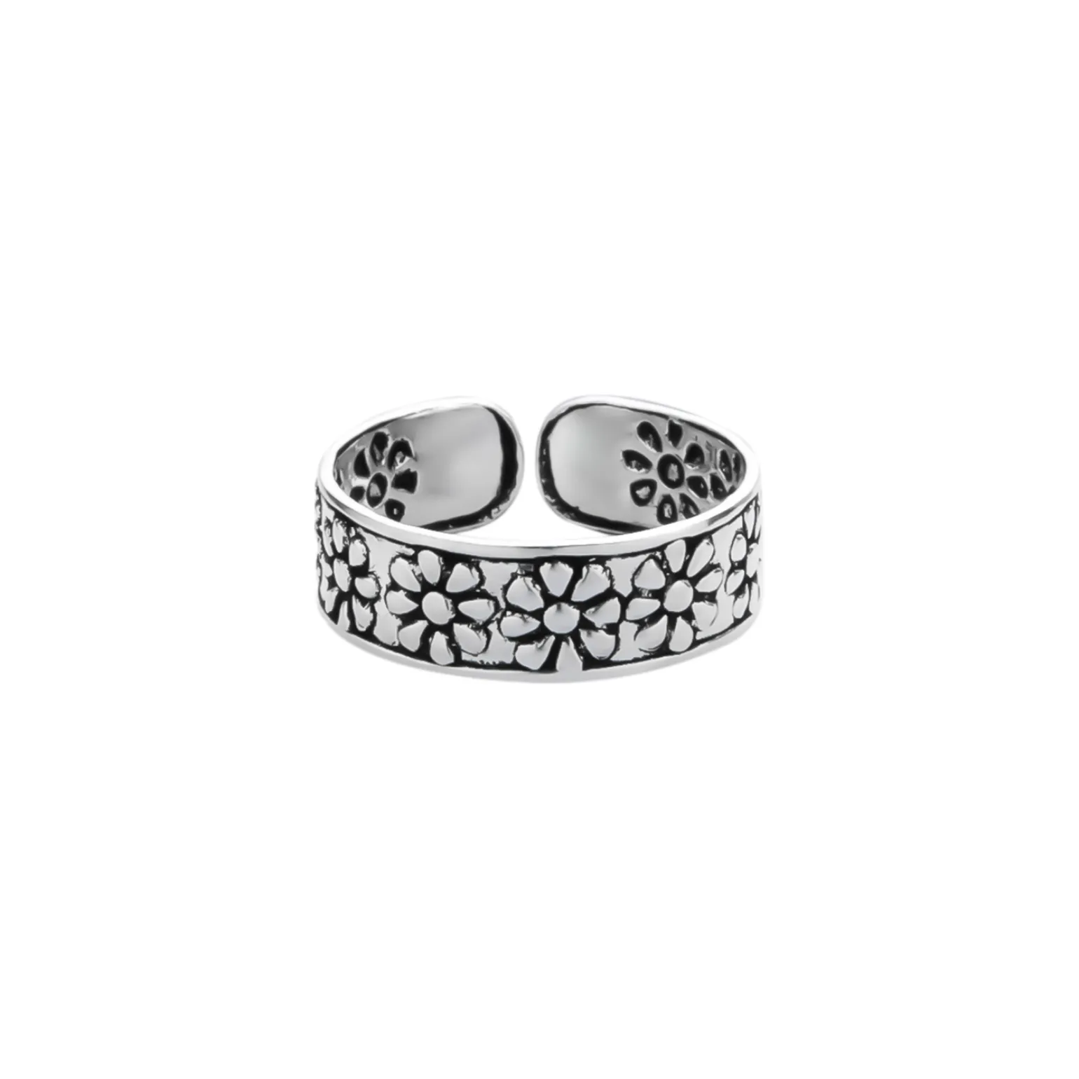Zilveren teenring, brede band met bloemen